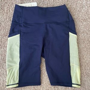 Fabletics on the go Medium 9 inch high waisted bike shirts, blue/green NWT